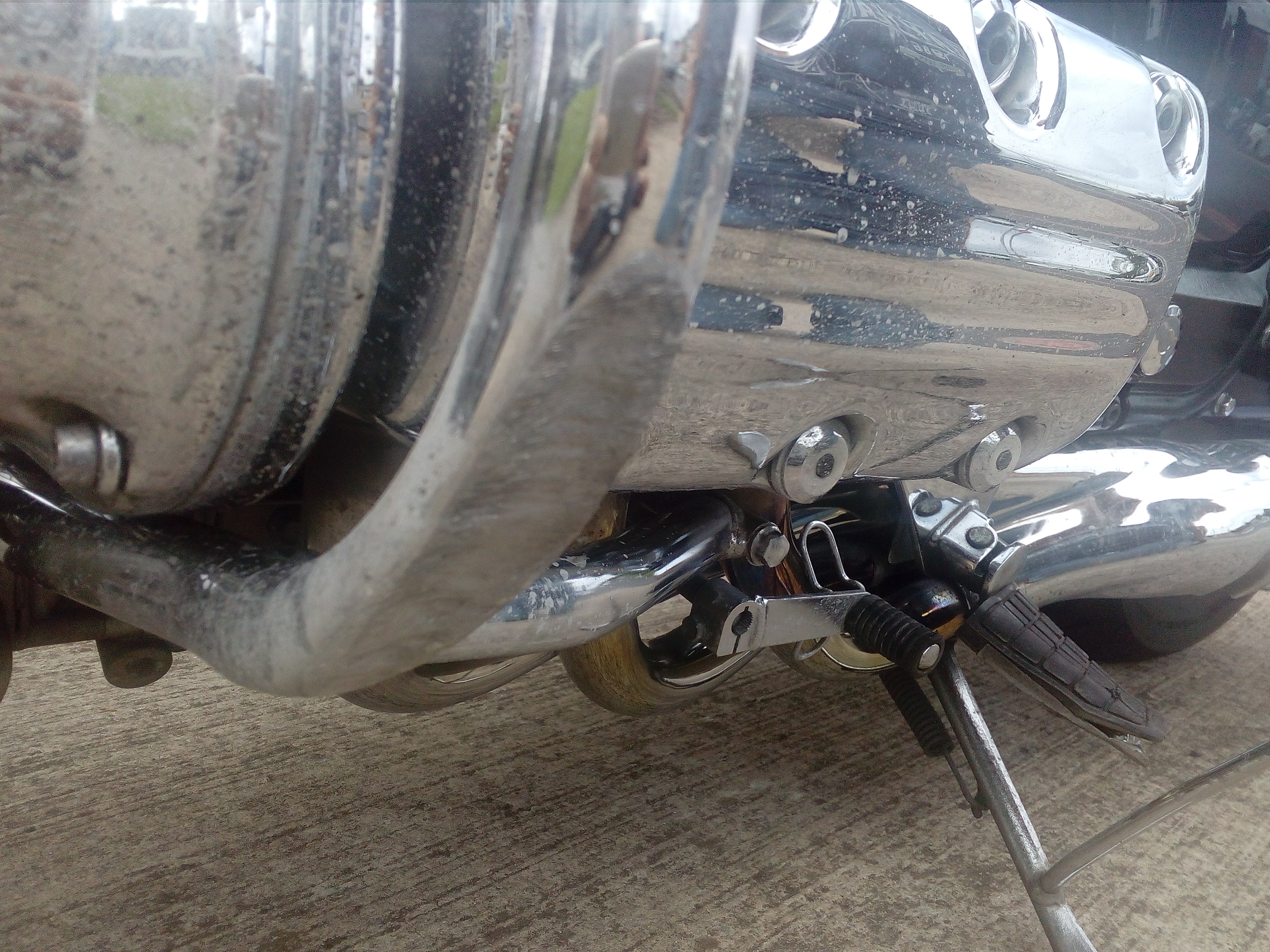 1774410G Damaged engine bar and footrest